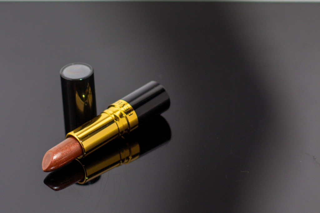 Deep coral liquid matte lipstick.